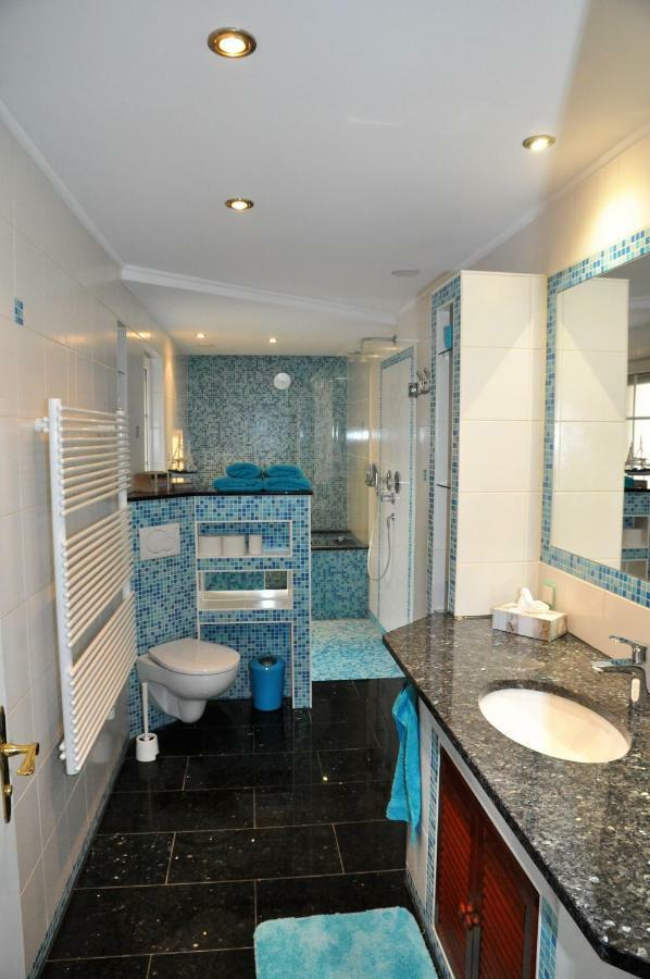 Apartmenthaus Am Zimmerplatz โฮฟไฮม์อัมเทานอส ภายนอก รูปภาพ