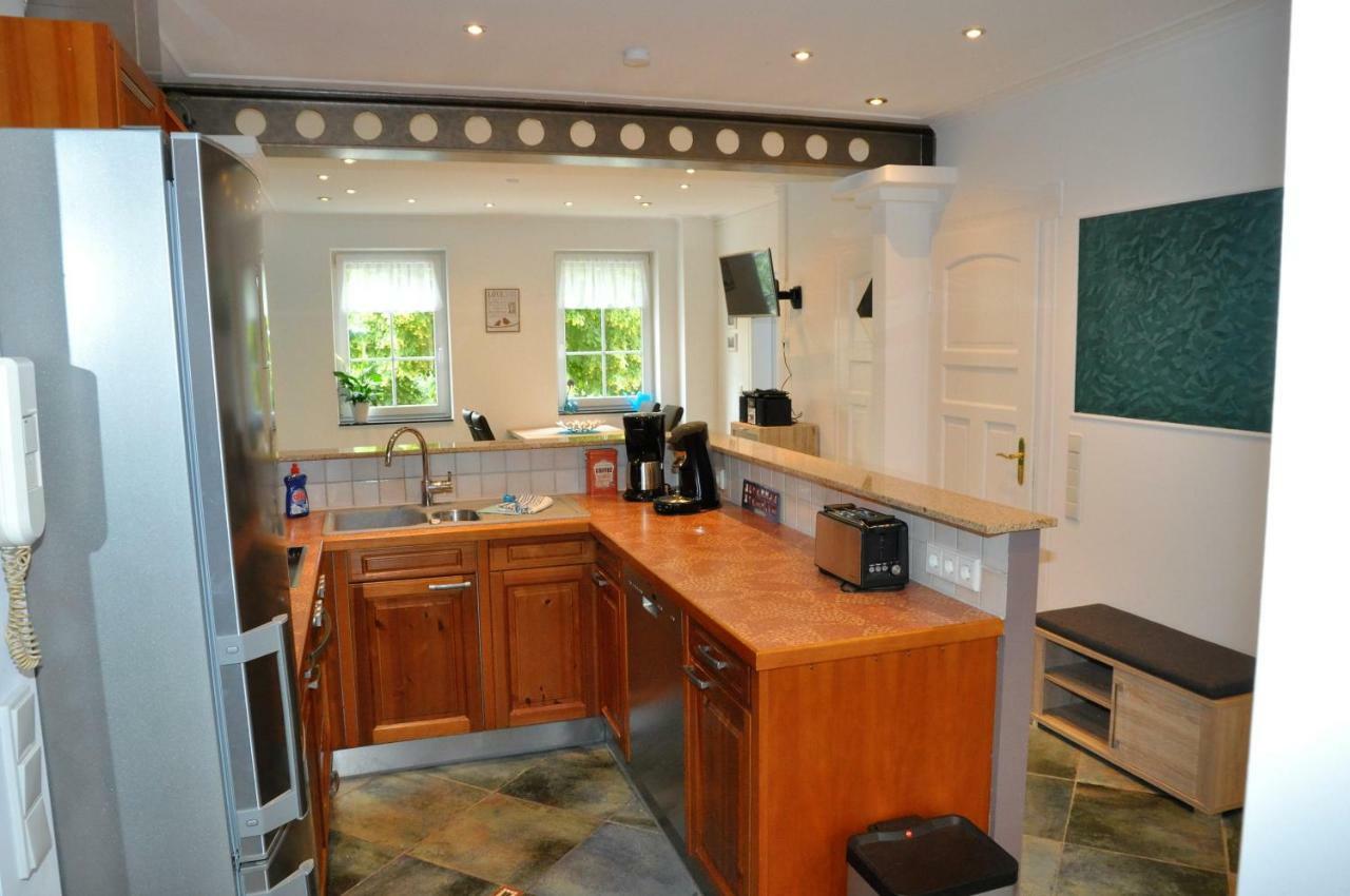 Apartmenthaus Am Zimmerplatz โฮฟไฮม์อัมเทานอส ภายนอก รูปภาพ